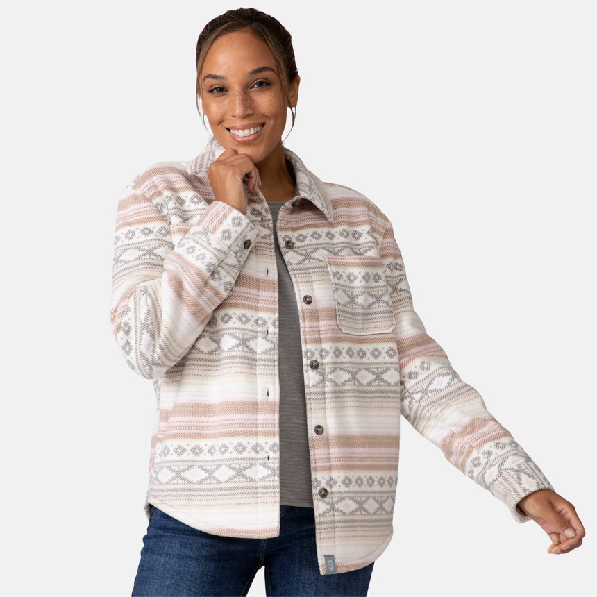 [Shelby is 5'9" wearing a size Small.] Woman wearing the Free Country Women's Chill Out Fleece Shirt Jacket in grey and pink aztec pattern, light-colored background.