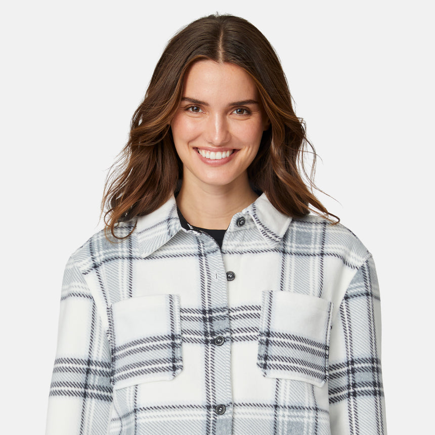 [Jessica is 5'9.5" wearing size S.] Woman wearing a plaid shirt on a white background