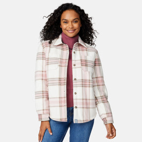 [Angelique is 5'10" wearing size S.] Woman wearing a pink plaid shirt over a turtleneck with a white background