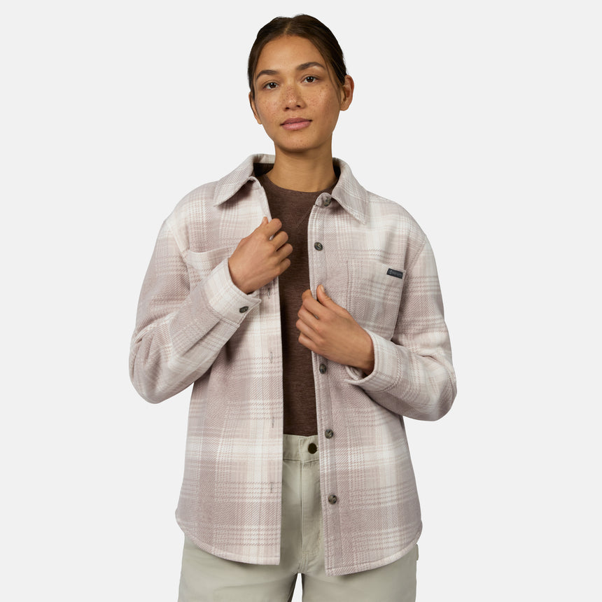 [Model is wearing size S.] A woman modeling a light beige and white plaid button-up overshirt with a brown t-shirt underneath, set against a plain light gray background.