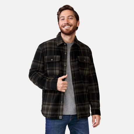 [Adam is 6' wearing a size Medium.] Man wearing Free Country Men's Mountain Ridge Sueded Chill Out Fleece Jacket in dark green with a full front button opening, chest pockets, smiling looking forward, light grey background. Perfect men’s jacket for fall weather.