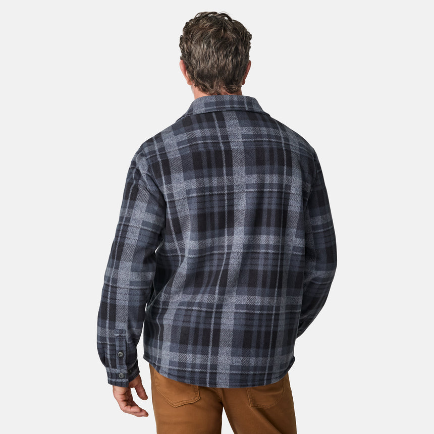 [Kolby is 6'2" wearing size M.] Men’s long-sleeve plaid shirt in dark blue and gray with button front and dual chest pockets — classic outdoor style