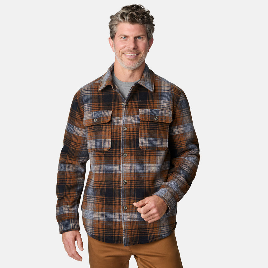 [Kolby is 6'2" wearing size M.] Men’s long-sleeve plaid button-up shirt in brown, black, and gray — features dual chest pockets with button closures and a relaxed fit
