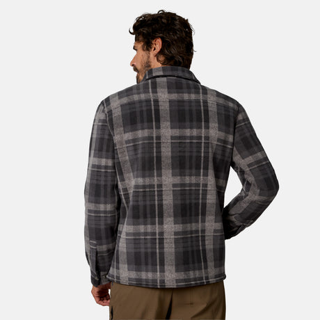 [Model is wearing size M.] A man shown from the back wearing a dark gray and black plaid flannel shirt, paired with brown pants, against a light gray studio background.