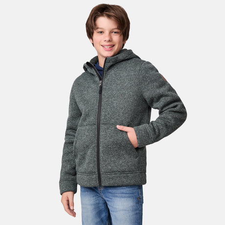 [River is wearing size M.] Model wearing a green-grey textured zip-up hoodie with front hand pockets and an adjustable hood, styled with blue jeans; cozy and casual layering ideal for cool-weather errands or outdoor lounging.