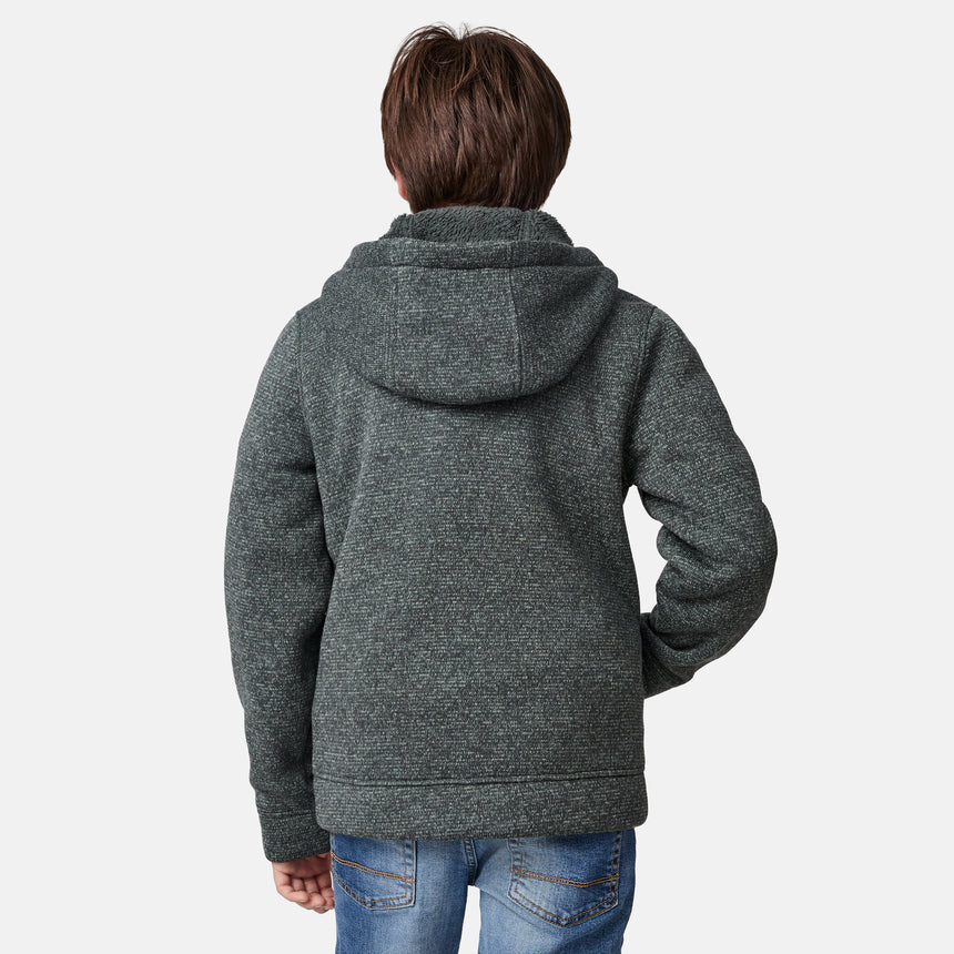 [River is wearing size M.] Model wearing a green-grey textured zip-up hoodie with front hand pockets and an adjustable hood, styled with blue jeans; cozy and casual layering ideal for cool-weather errands or outdoor lounging.