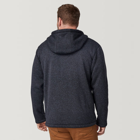[Joe is 6'0" wearing size M.] Man wearing a black textured hooded jacket on a white background