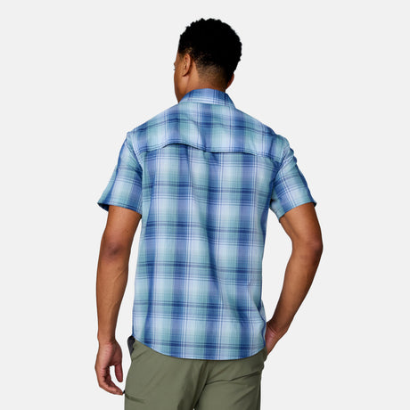 [Josiah is 6'3" wearing a size Medium.] in Green Plaid, size M, made from lightweight moisture wicking polyester fabric featuring vent at the back, full button down front, and a stand collar, styled with green shorts #color_green-plaid