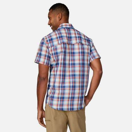 [Anderson is 6'2" wearing a size Medium.] in Rust Plaid, size M, made from lightweight moisture wicking polyester fabric featuring vent at the back, full button down front, and a stand collar, styled with khaki shorts #color_rust-plaid