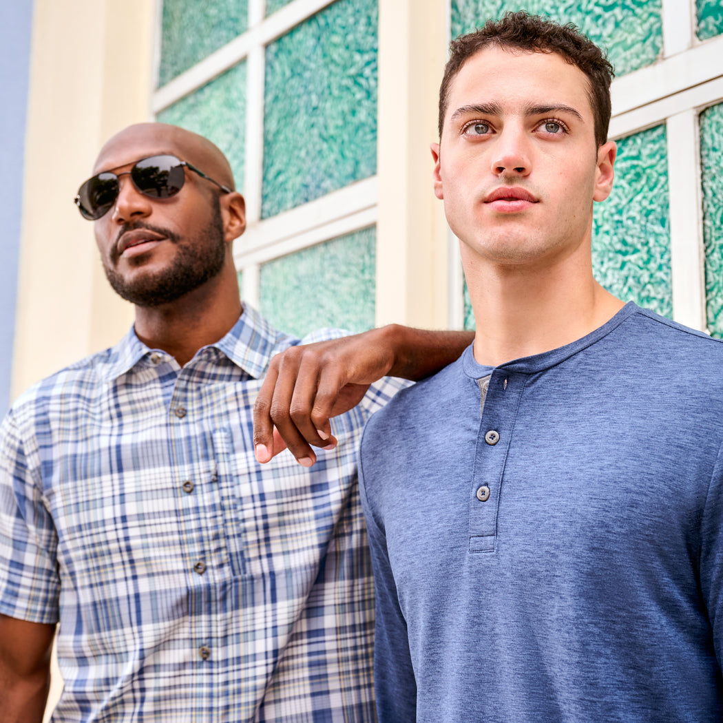 two men standing next to each other
