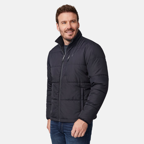 [Joe is 6’0” wearing size M.] Man wearing Free Country Men's Ski Patrol 3-in-1 Systems Jacket in black with a full front zipper opening, an outer jacket for wind and cold weather, an inner puffer jacket, and wind resistant and water resistant stretch performance fabric, light grey background. Perfect men’s jacket for winter weather.