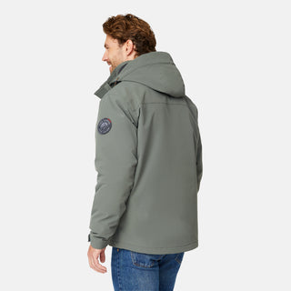 [Matt is 6’2” wearing size M.] Man wearing Free Country Men's Ski Patrol 3-in-1 Systems Jacket in grey with a full front zipper opening, an outer jacket for wind and cold weather, an inner puffer jacket, and wind resistant and water resistant stretch performance fabric, light grey background. Perfect men’s jacket for winter weather.