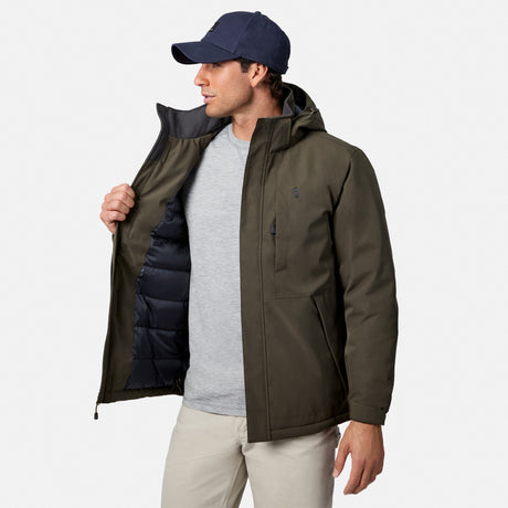 Man wearing olive Denali Insulated Jacket open to reveal navy quilted lining with gray T shirt and navy cap.