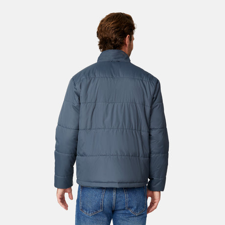 [Matt is 6’2” wearing size M.] Man wearing Free Country Men's Ski Patrol 3-in-1 Systems Jacket in grey with a full front zipper opening, an outer jacket for wind and cold weather, an inner puffer jacket, and wind resistant and water resistant stretch performance fabric, light grey background. Perfect men’s jacket for winter weather.