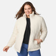 [Karissa is 5'9.5" wearing size 1X.] Woman wearing a cream quilted reversible Free Country jacket on a white background