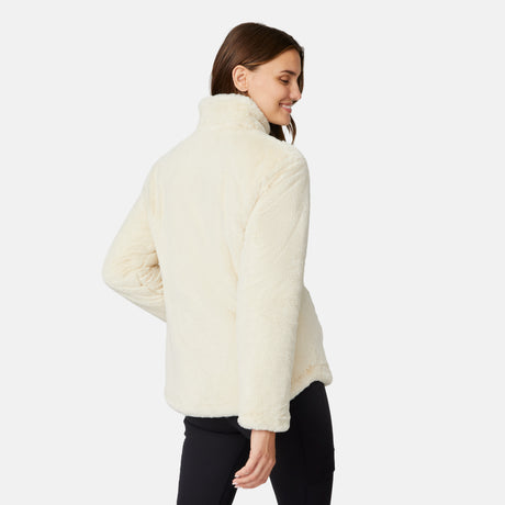 [Jessica is 5'9.5" wearing size S.] Woman wearing a brown quilted reversible Free Country jacket on a white background