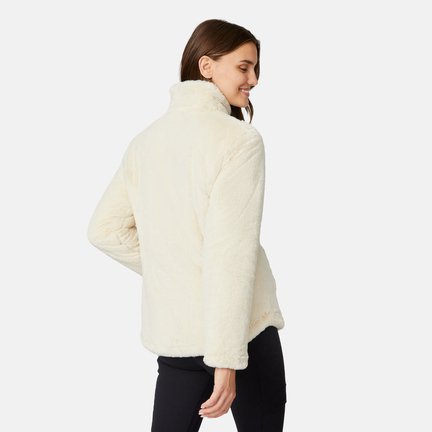 [Jessica is 5'9.5" wearing size S.] Woman wearing a brown quilted reversible Free Country jacket on a white background