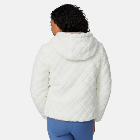 [Angelique is 5'10" wearing size S.] Light brown quilted reversible jacket with fleece-lined hood, zip front, and pockets; worn over grey shirt and blue pants.