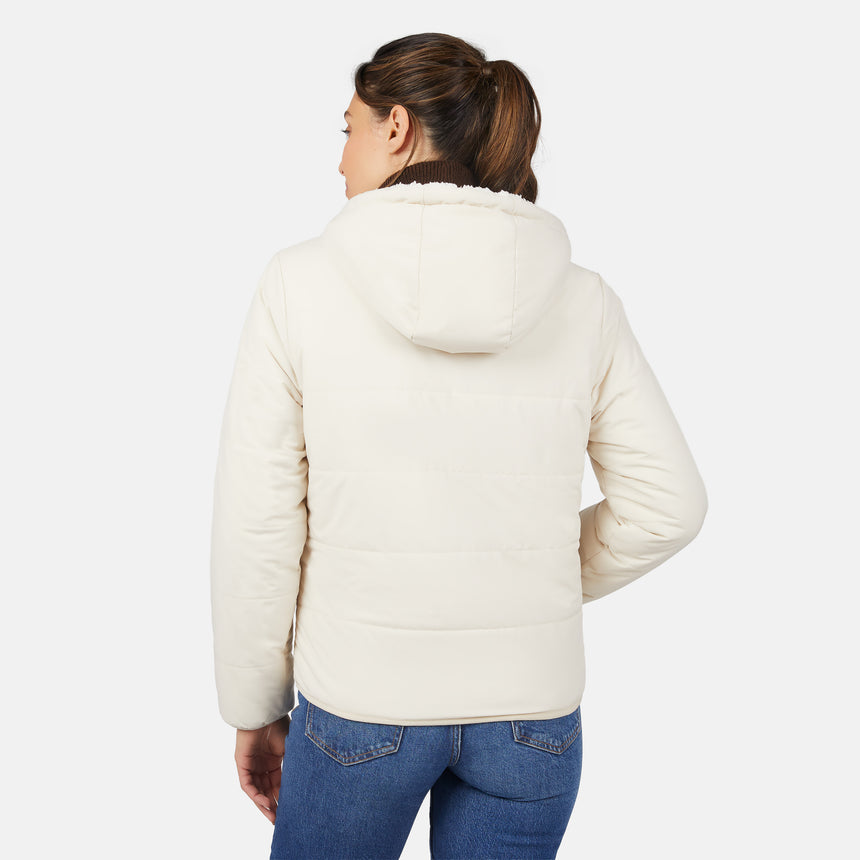 [Olga is 5'9" wearing size S.] Light quilted hooded jacket with zip front and padded warmth; styled over dark turtleneck and blue jeans.