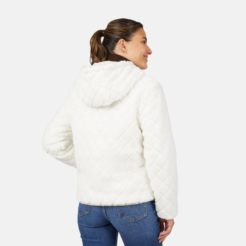 [Olga is 5'9" wearing size S.] Light quilted hooded jacket with zip front and padded warmth; styled over dark turtleneck and blue jeans.