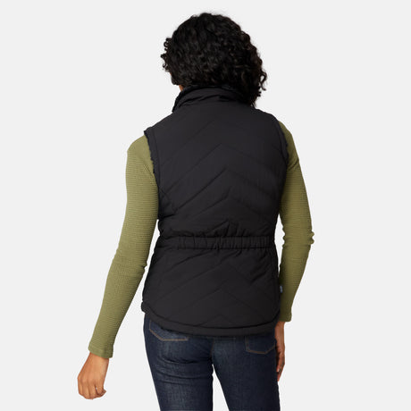 [Angelique is 5'10" wearing size S.] Person wearing a black puffer vest over a green long-sleeve shirt on a white background