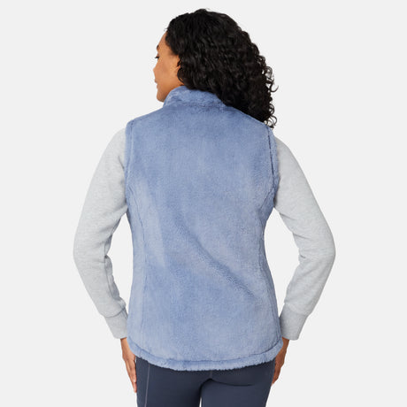 [Angelique is 5'10" wearing size S.] Person wearing a light blue fleece vest over a gray shirt on a white background