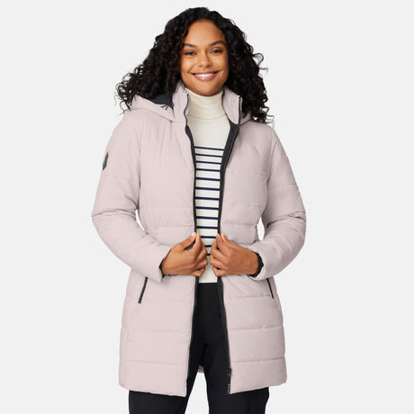 [Angelique is 5'10" wearing size S.] Woman wearing a white long puffer coat with black accents on a white background