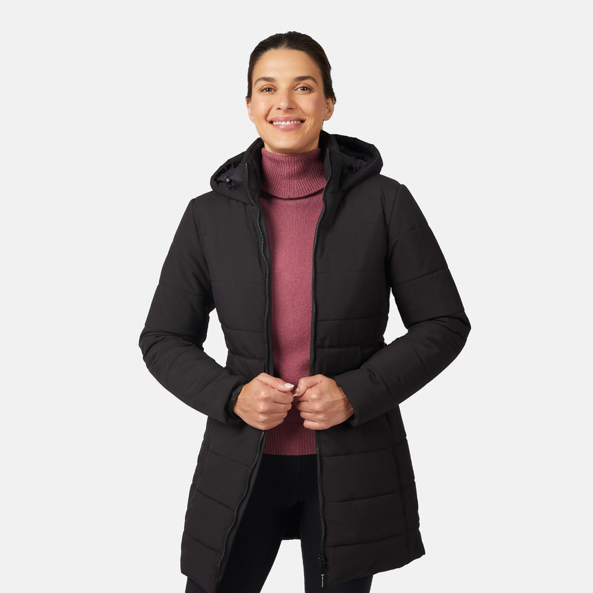 [Olga is 5'9" wearing size S.] Woman wearing a black long puffer coat on a white background