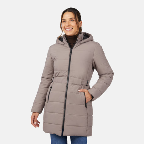 [Olga is 5'9" wearing size S.] Woman wearing a beige puffer coat on a white background