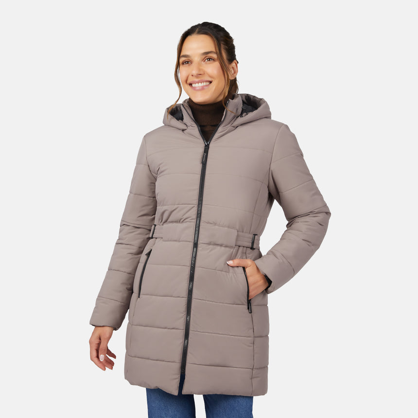 [Olga is 5'9" wearing size S.] Woman wearing a beige puffer coat on a white background