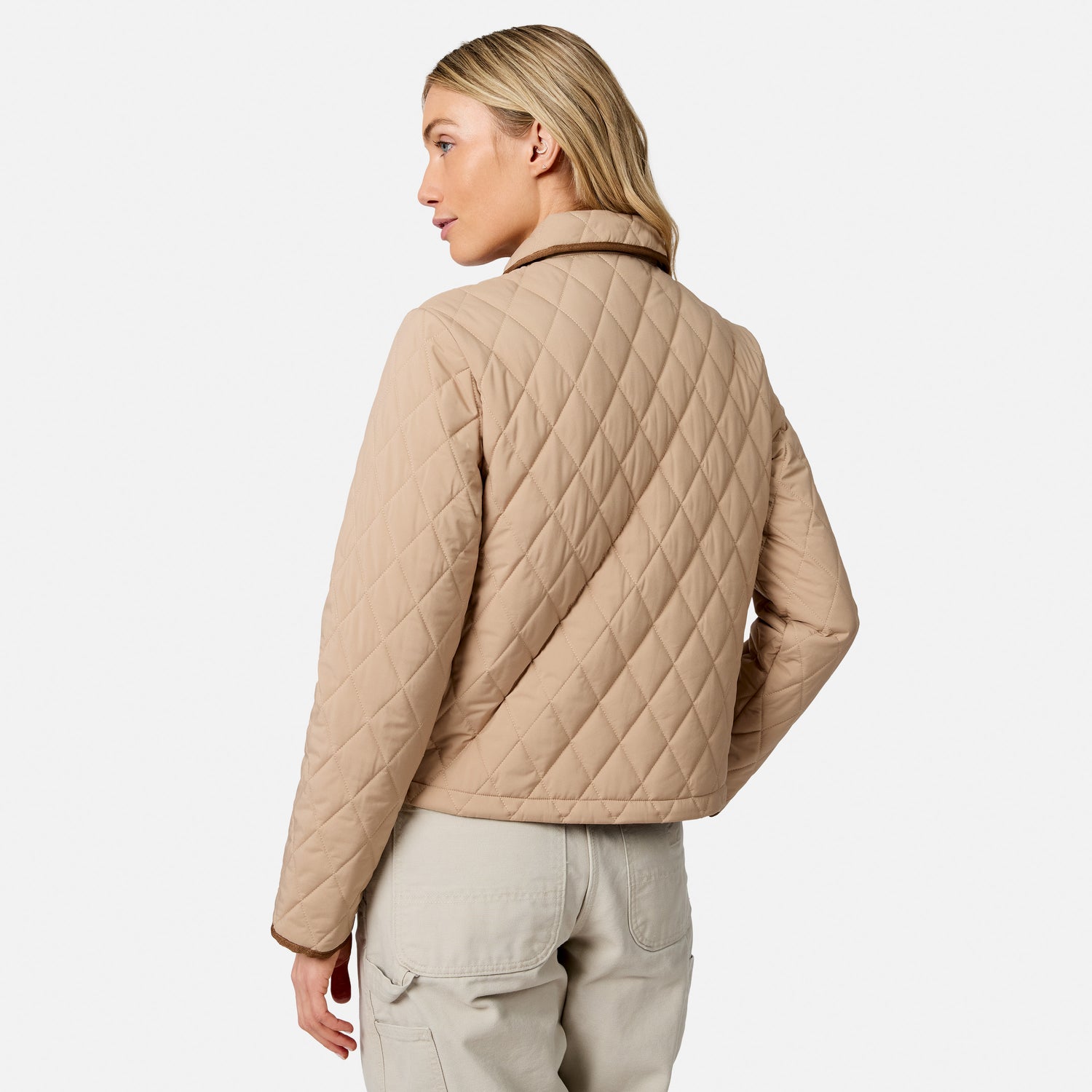[Model is wearing size S.] A woman shown from the back wearing a light beige quilted jacket and light khaki cargo pants against a plain light gray studio background.