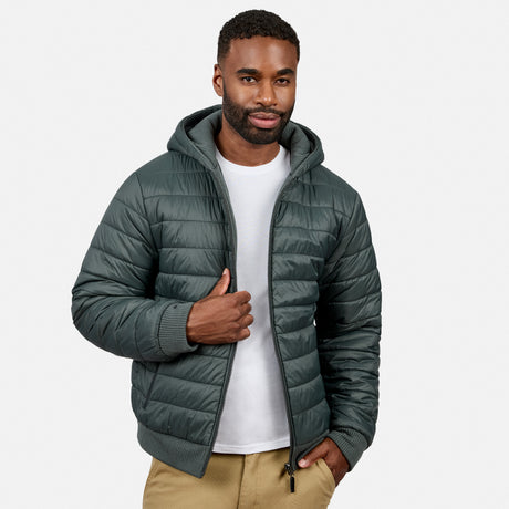 Mid-torso view of man in a dark green zip-front hooded fleece jacket with tan pants, one hand near the zipper.