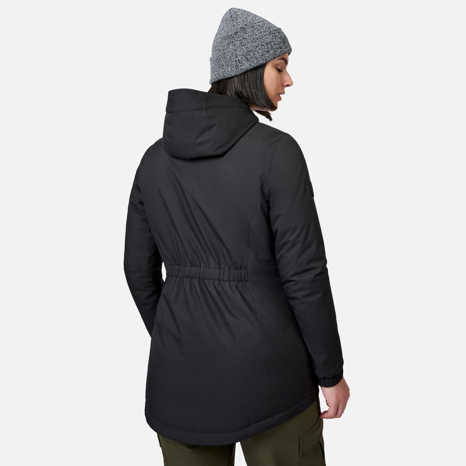 [Model is wearing size S.] Profile of a woman in a black Women's X2O Thermo Rain Jacket with hood up and gray knit hat