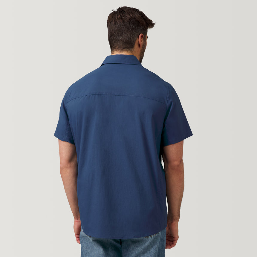[Justin is 6'1" and wearing a size M] Men's Arcadia Short Sleeve Shirt - Dark Denim - M #color_dark-denim
