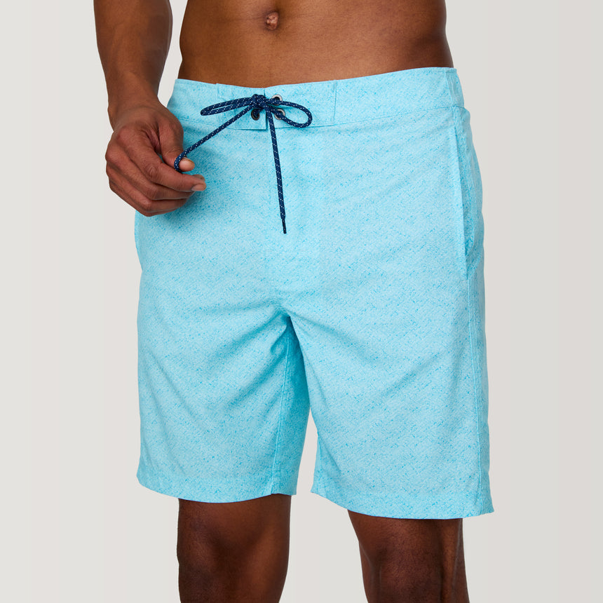 [Model is wearing a size Medium.] Men's Textured Surf Swim Short - M - AQUA #color_aqua