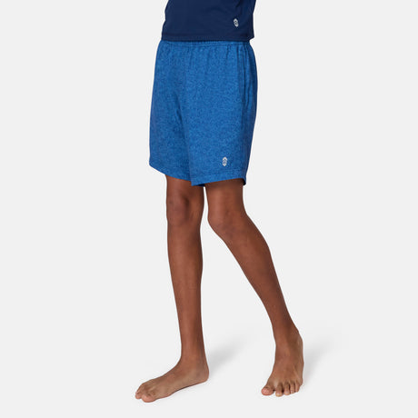 [Emporer is wearing size 10/12 Medium] child wearing blue textured swim shorts with a brand logo on a white background.
