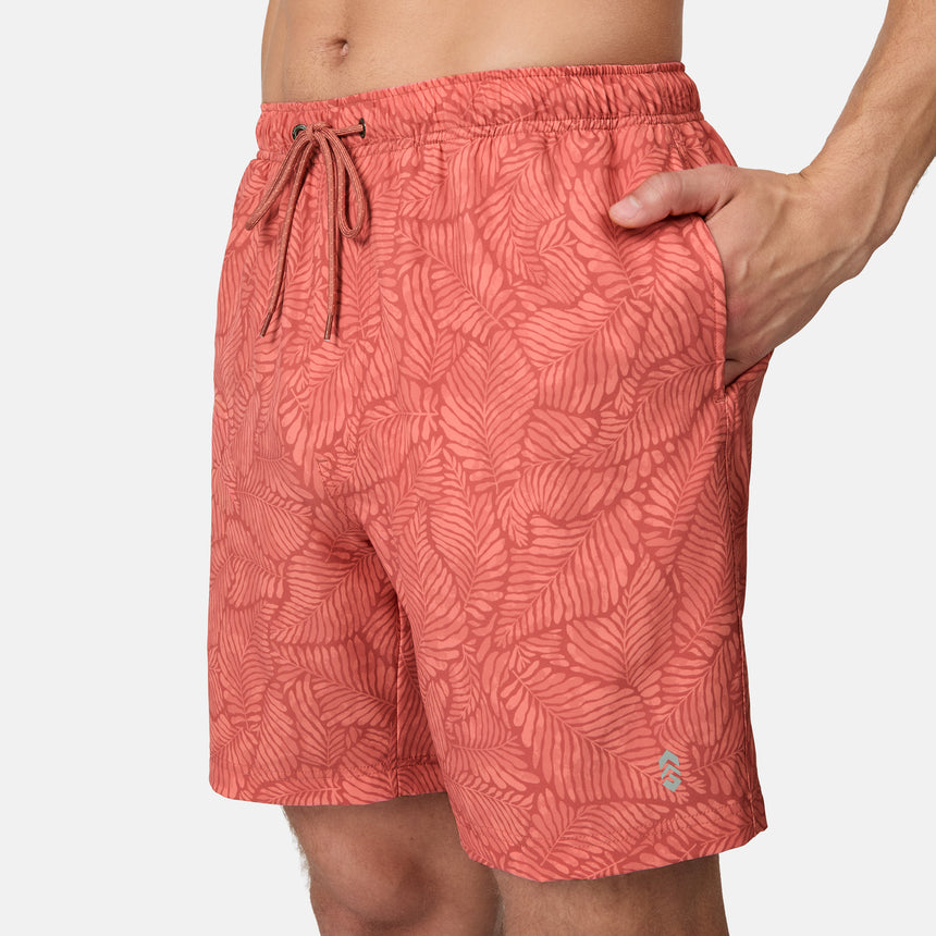 [Model is wearing size M] Red patterned shorts worn by a person on a white background