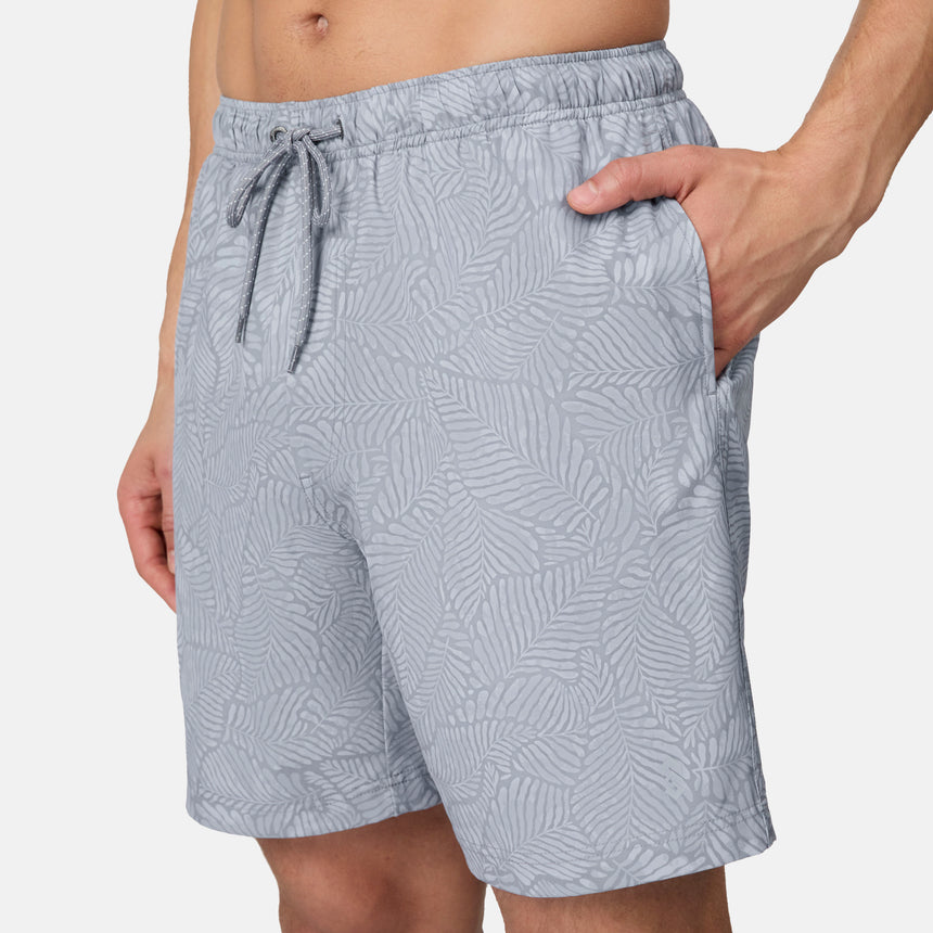 [Model is wearing size M] Gray patterned shorts worn by a person on a white background