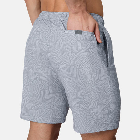 [Model is wearing size M] Gray patterned shorts worn by a person on a white background