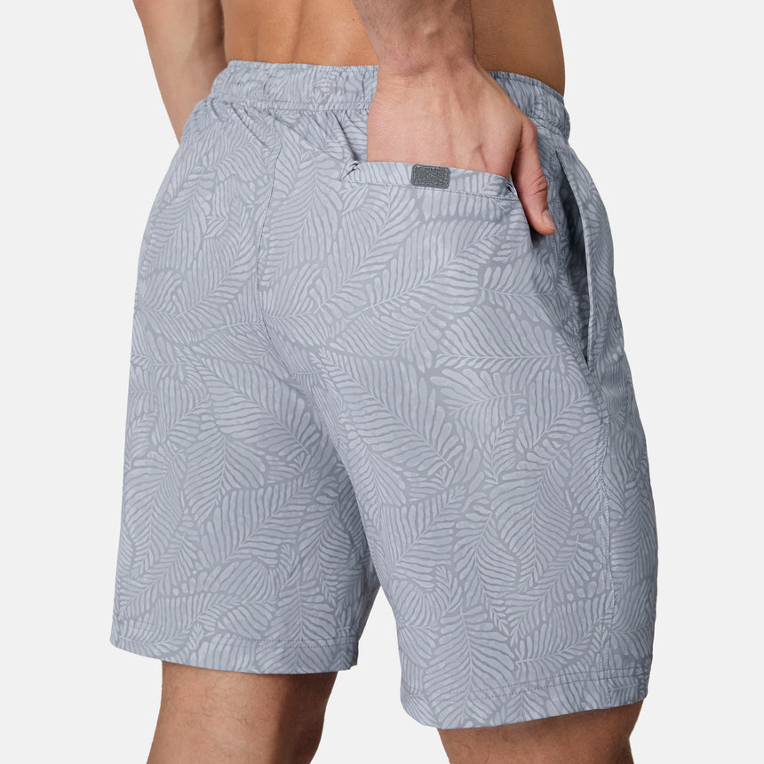 [Model is wearing size M] Gray patterned shorts worn by a person on a white background
