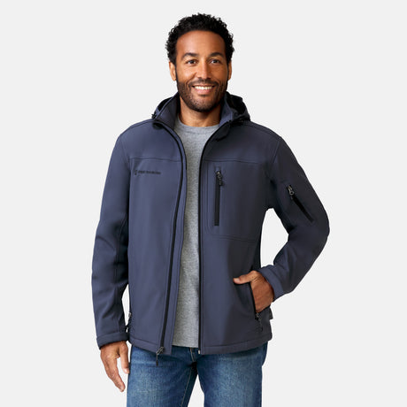 [Jonathan is 6'1" wearing a size Medium.] Man wearing Free Country Men's Odyssey II Flex Super Softshell® Jacket in dark grey with a full front zipper opening, adjustable cuff openings, and wind and water resistant stretch performance fabric, light grey background. Perfect men’s jacket for fall weather.