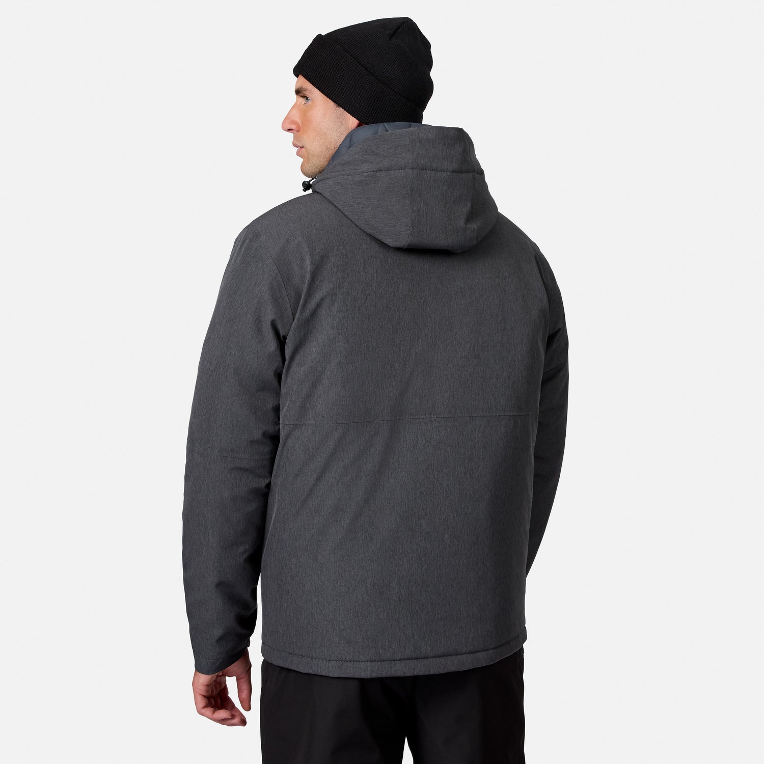 [Model is wearing size M.] A man wearing a dark gray hooded jacket, black beanie, and black pants, shown from a rear three-quarter view against a light gray studio background.