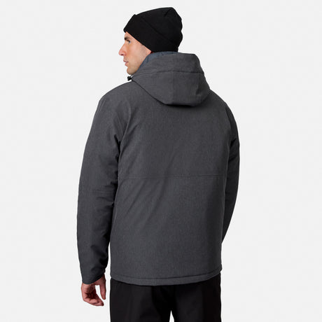 [Model is wearing size M.] A man wearing a dark gray hooded jacket, black beanie, and black pants, shown from a rear three-quarter view against a light gray studio background.