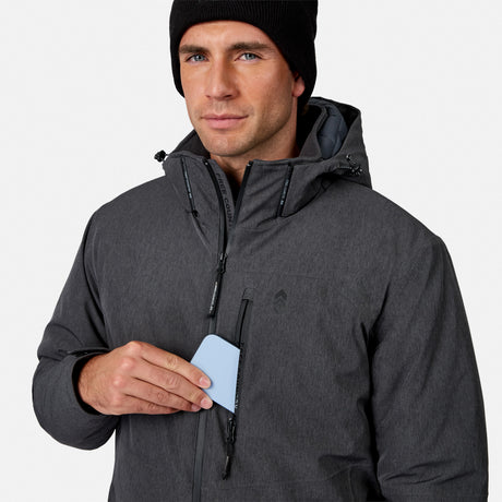 [Model is wearing size M.] A man wearing a dark gray hooded jacket and black beanie, holding a light blue card in the front pocket of the jacket, against a light gray background.