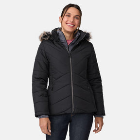 [Olga is 5’9" wearing a size Small.] Woman wearing Free Country Women's Brisk II Parka Jacket in black with a full front zipper opening, soft lining, attached hood with faux fur trim, recycled polyester fill, and water resistant and wind resistant stretch performance fabric, light grey background. Perfect women’s  jacket for fall weather.
