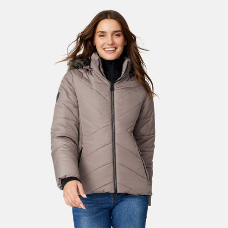 [Jessica is 5'9.5" wearing size S.] Woman wearing a beige quilted jacket on a white background