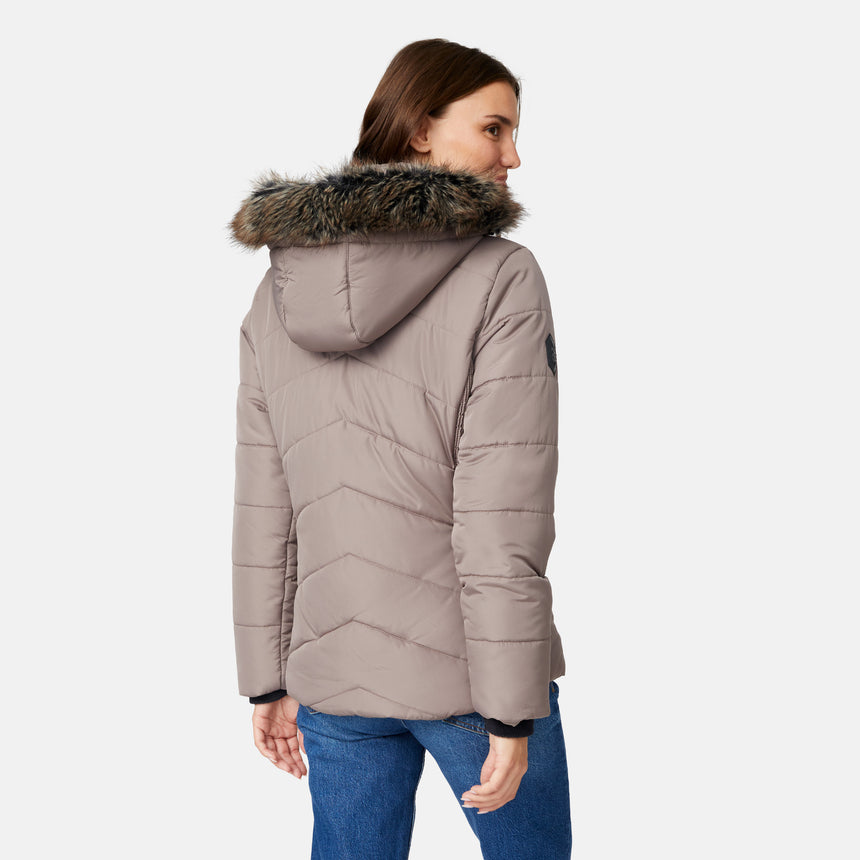[Jessica is 5'9.5" wearing size S.] Woman wearing a beige quilted jacket on a white background