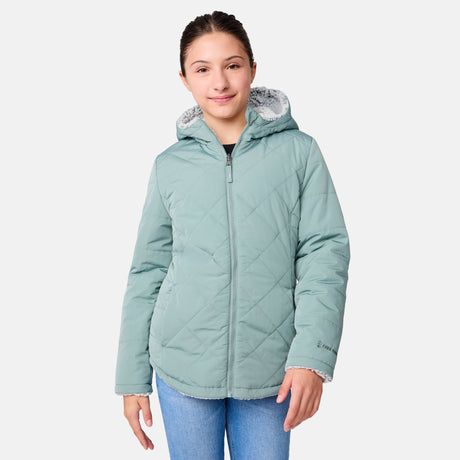 [Samantha is wearing size M] Model wearing a quilted light green Free Country hooded jacket with plush interior lining and full front zip; styled with denim for a relaxed, outdoors-ready look.