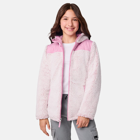 [Samantha is wearing size M] Model wearing a quilted light pink Free Country hooded jacket with diagonal stitching and soft interior lining; casually styled with gray utility pants and a white tee for a laid-back, trail-to-town vibe.