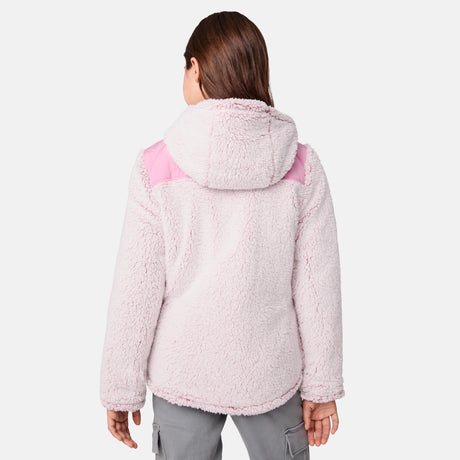 [Samantha is wearing size M] Model wearing a quilted light pink Free Country hooded jacket with diagonal stitching and soft interior lining; casually styled with gray utility pants and a white tee for a laid-back, trail-to-town vibe.